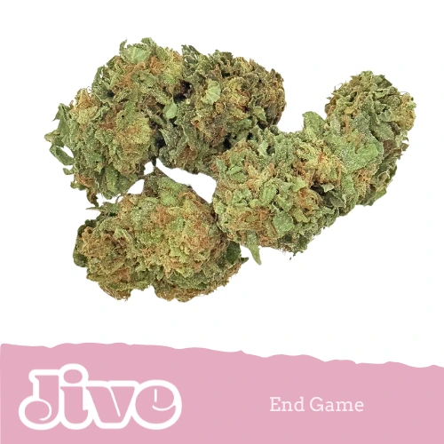 Close-up of dried cannabis buds labeled "End Game" by Jive on a white and pink background.